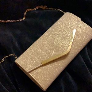 Glittery gold 4x10 clutch purse.